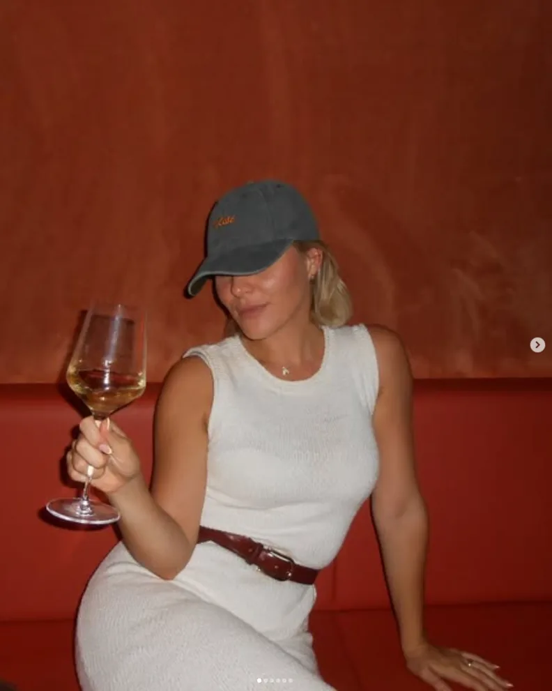 Guest with a glass of wine