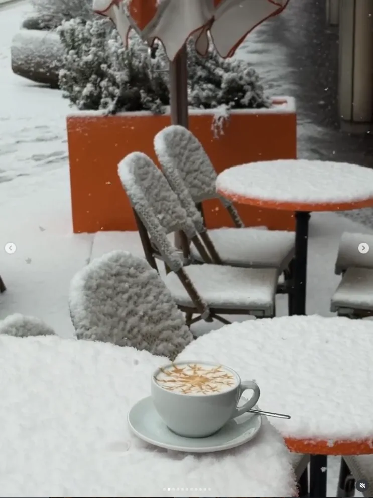 Snowy terrace with a coffee